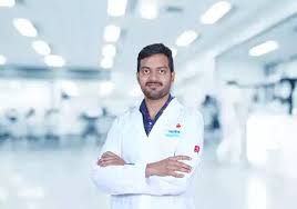 Dr Abhilash N